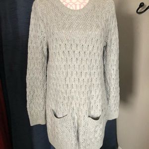 Grey tunic sweater with braided pattern